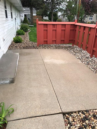 Greenville patio and paver pressure washing removing weed growth and efflorescence stains
